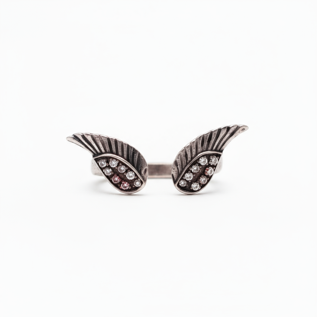 Twin wing silver ring detail view